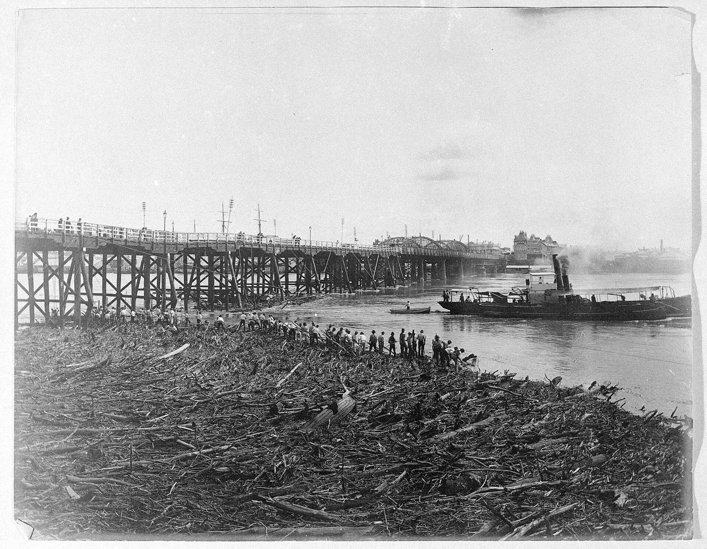 cleanup work after river flooding